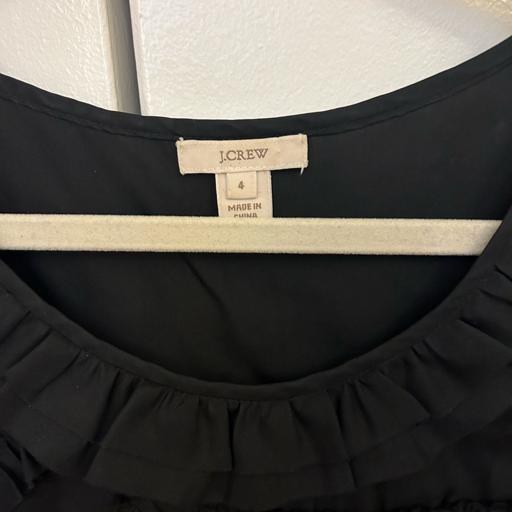 Black silk jcrew tank. Great for work or white white jeans.
